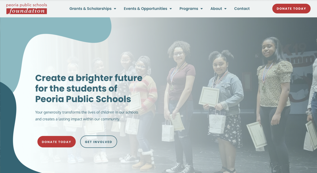 An image of a website, displaying a group of children at a school.