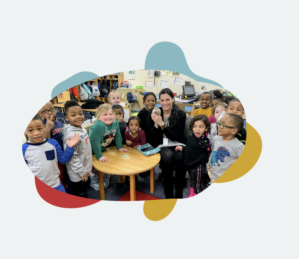 A teacher surrounded by students. Bubbly shapes surround the image.